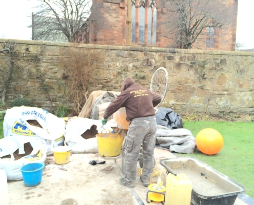 Rebuilding the stonewalling using a lime mortar and lay aside stone